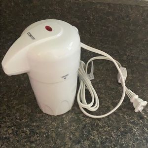 Conair heated lotion dispenser.